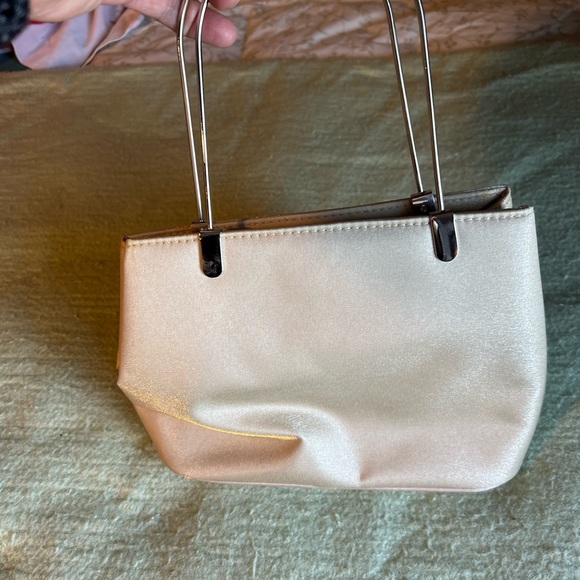 Soft champagne colored cocktail handbag with metal hardware - Picture 2 of 12